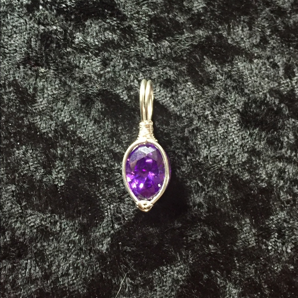 Purple zircon pendant